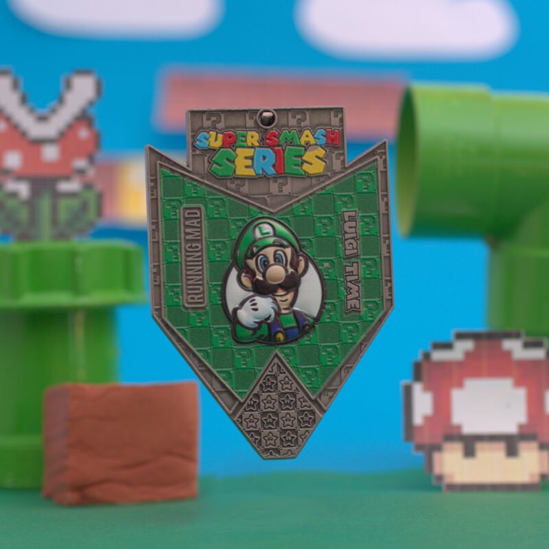 Luigi medal with a video game-inspired background.