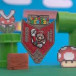 Mario medal from the Super Smash Series celebrating the iconic video game character.
