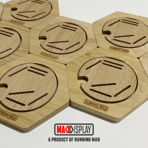 Wooden hexagonal medal holders with Running Mad logo
