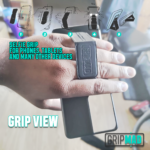 Hand holding a phone with GripMad's ergonomic black selfie grip.