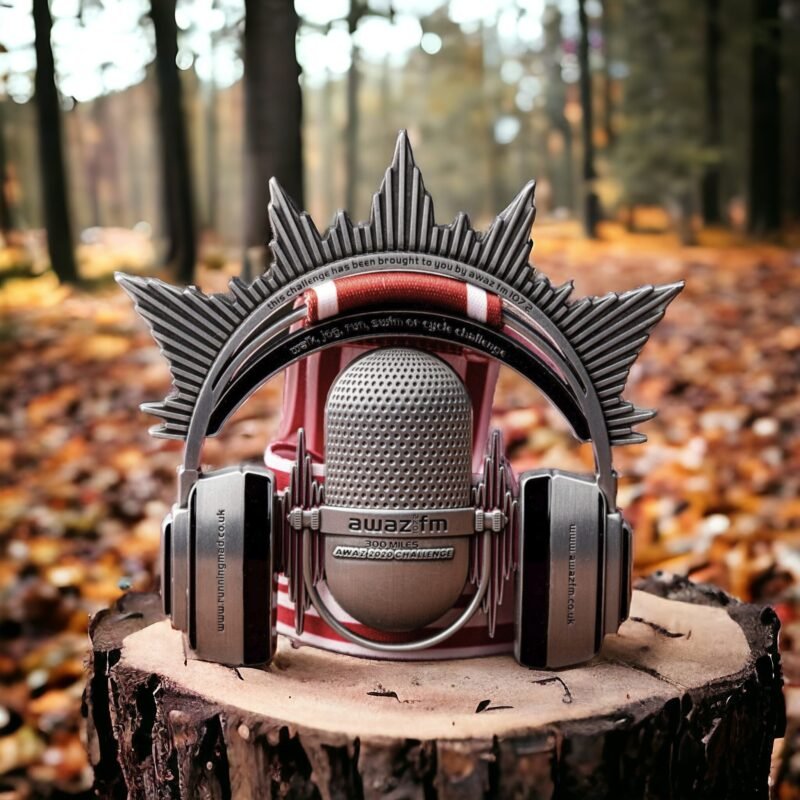 Virtual Challenge medal with microphone design, set against a serene autumnal forest backdrop.