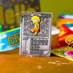 The Simpsons Series fun run challenge medal with Lisa Simpson playing the saxophone