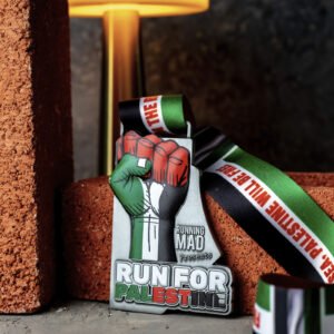 Run for Palestine medal on outdoor natural backdrop