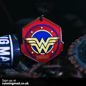 Vibrant Wonder Woman emblem running medal with patriotic color scheme.