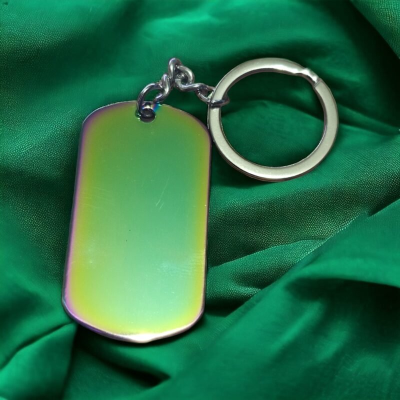 Rainbow Gold Keyring on Green Fabric