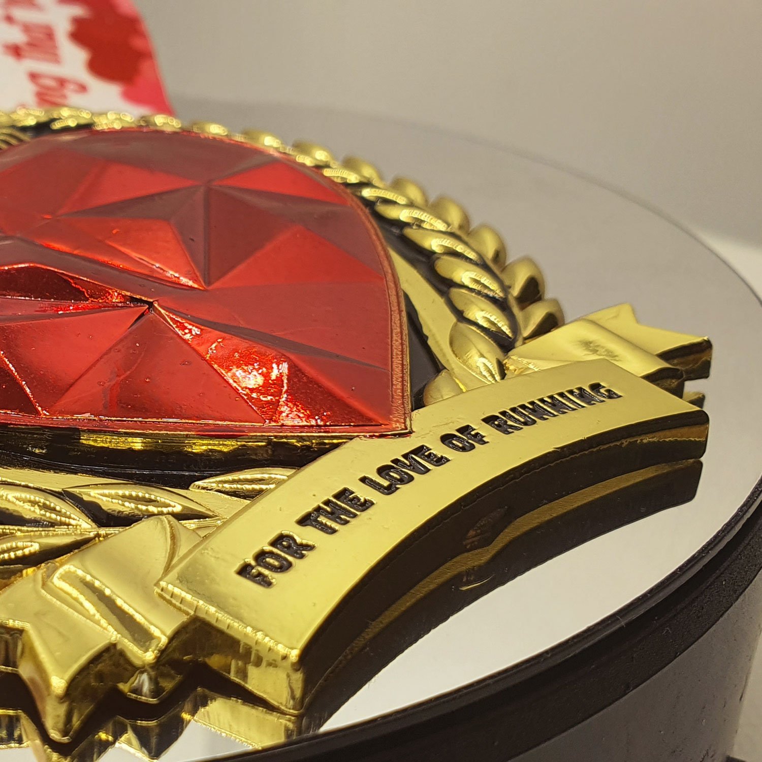 For the Love of Running heart medal and key – detail 1